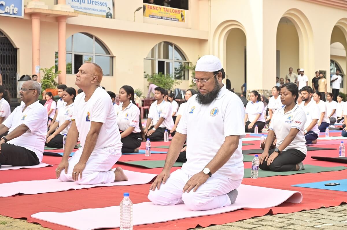Hon'ble Chancellor Mahbubul Hoque and other officials performing Yoga
